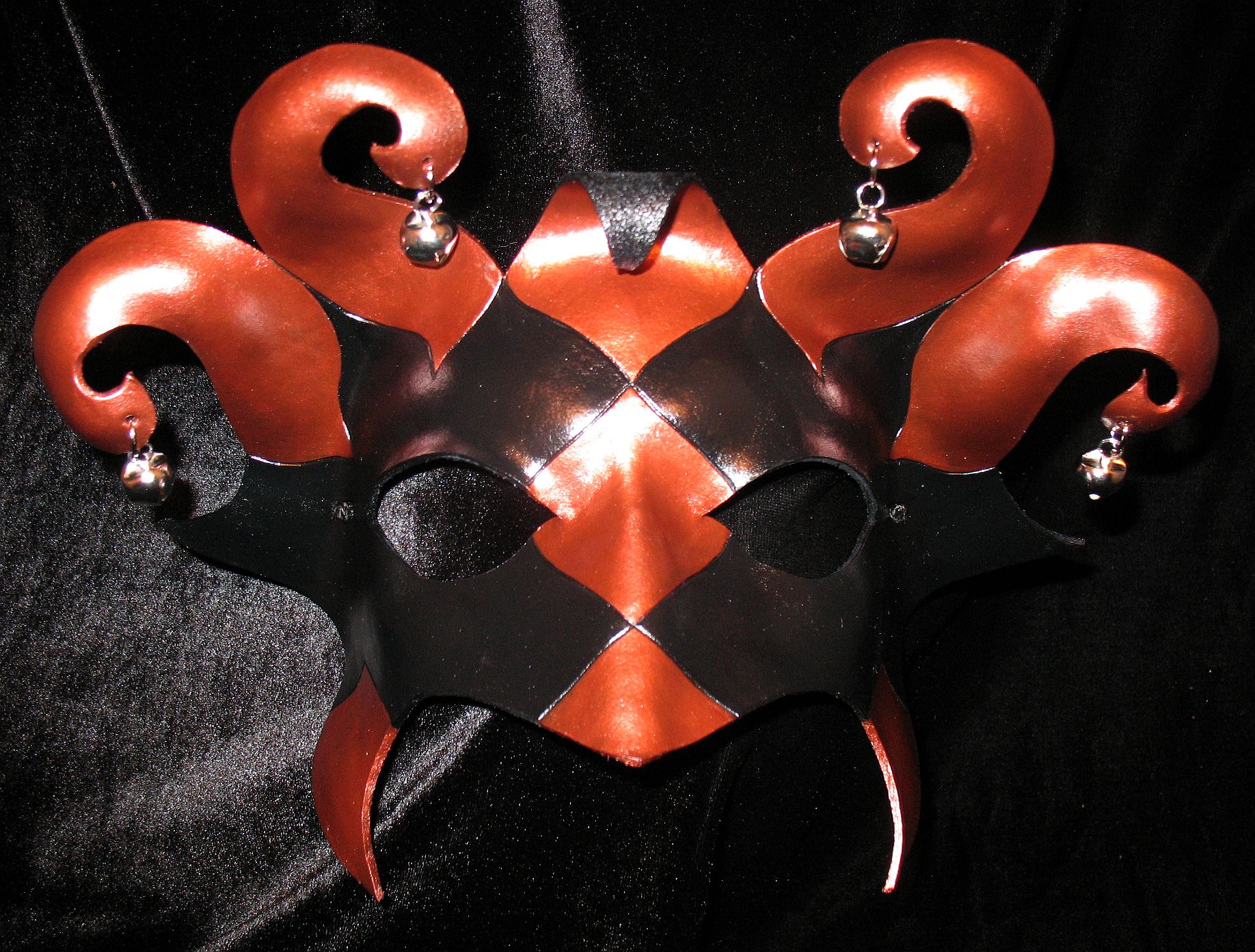 Copper & black Dark Jester mask.